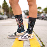 modeled socks, vans, checkered pattern, black socks, yellow, road, pavement, street, biking, cruising.