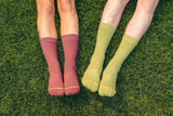 brick, field, grass, green grass, repreve socks, crew socks, cool socks.