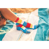 blanket, expert comfort, red, yellow, white, blue, multiple striped, patterned socks